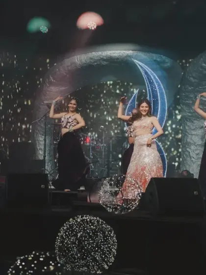 Another angle of the bride's elegant solo performance, highlighting the choreography and the futuristic stage design.