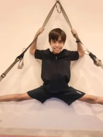 Suspension straps are a great tool for safely achieving deep stretches. This exercise is excellent for opening the hips and developing the flexibility needed for high kicks.