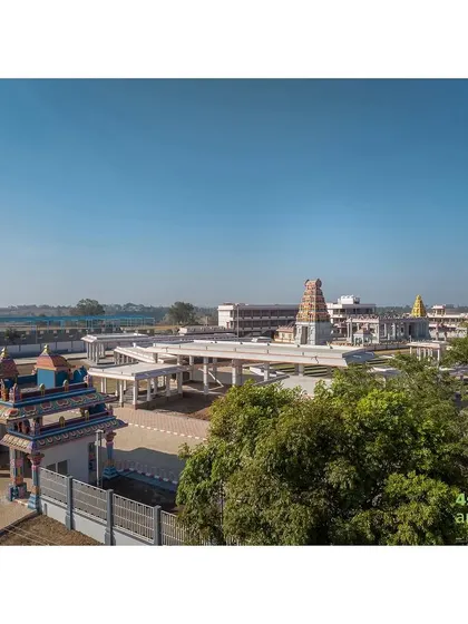 The entry pavilion provides a welcoming transition from the outside world into the sacred grounds of the Shiva Temple complex.