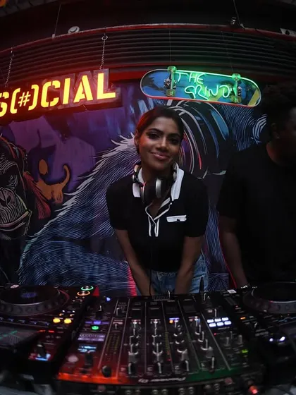 A classic shot of me at the console, with the iconic Social graffiti in the background.