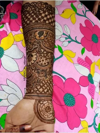 A slightly different angle of the same detailed arm design, showing the consistency and neatness of the pattern.