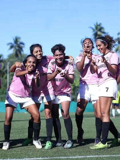 A fun, celebratory team pose after a dominant performance.