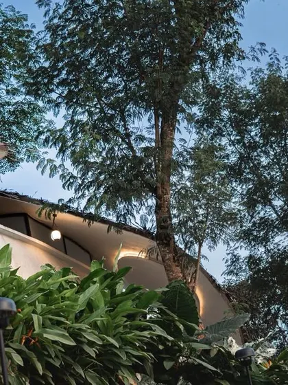 The unique, flowing roofline of 'Earth's Embrace' is designed to follow the site's natural contours with zero disturbance to the existing landscape.