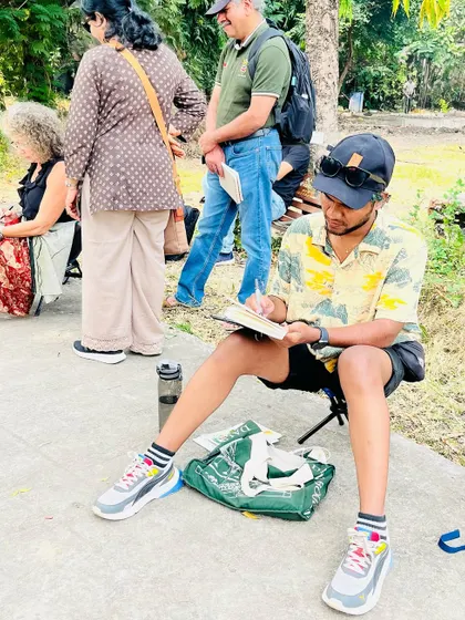 A candid moment of concentration during the sketch walk. These events are a great mix of social fun and focused creative time.