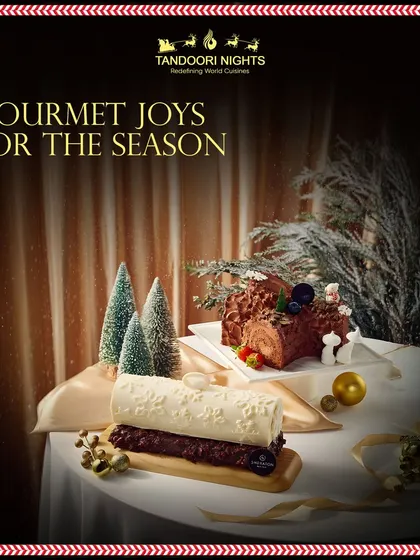 Gourmet joys for the season. Our festive dessert table features beautifully crafted yule logs, adding a touch of magic to your Christmas celebration.