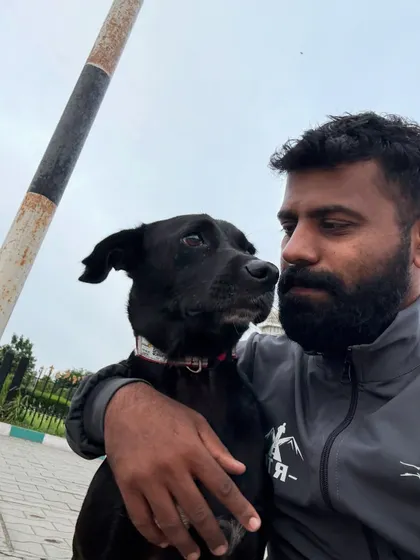 A beautiful selfie with Batman, with Vidhana Soudha in the background.