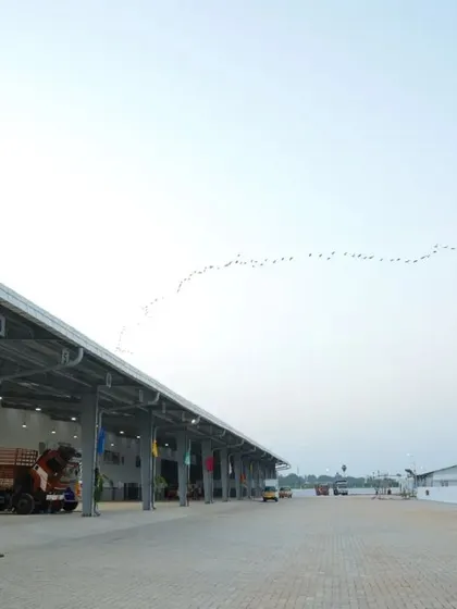 The long, covered loading and service bays are a key feature of our design, protecting operations from the elements and allowing for efficient, uninterrupted workflow. This is a core component of effective industrial facility design.