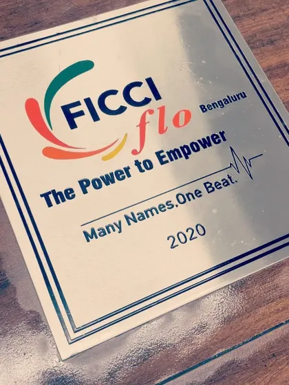 This plaque from FICCI FLO commemorates the creation of our upcycled mural, which now stands 10 feet tall at the T3 terminal of the New Delhi Airport. It is a powerful example of how art can promote sustainability and empower women artists.