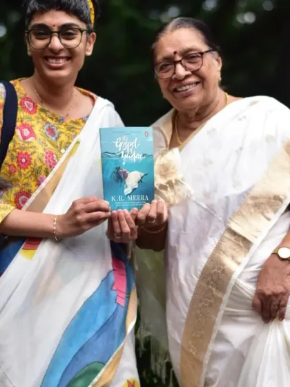 Posing with K.R. Meera and her book. My love for literature is a core part of who I am and why I believe in connecting people through shared interests.