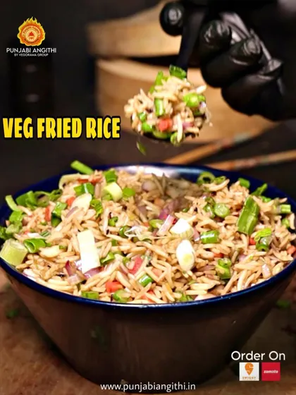 Simple, classic, and always delicious. Our Veg Fried Rice is tossed with fresh vegetables and seasoned to perfection.