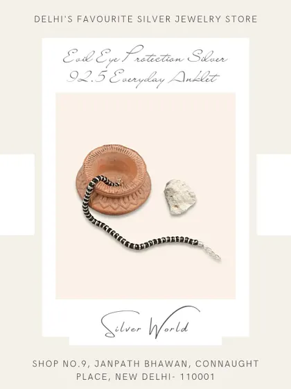 An everyday anklet made with silver and black beads, offering protection from the evil eye. This is a classic 'nazaria' design.