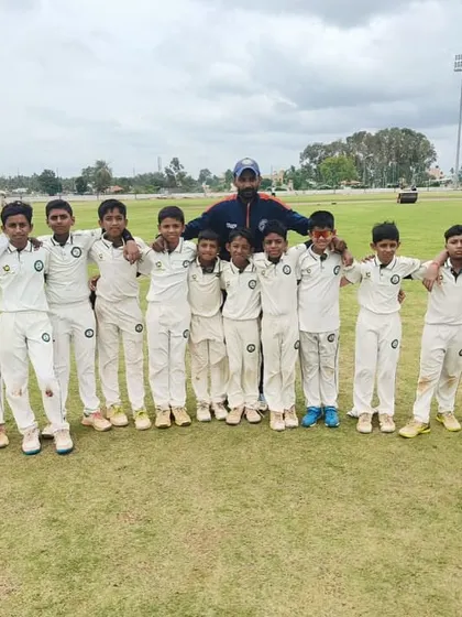 The U-12 team lines up for a photo, united and ready to play.