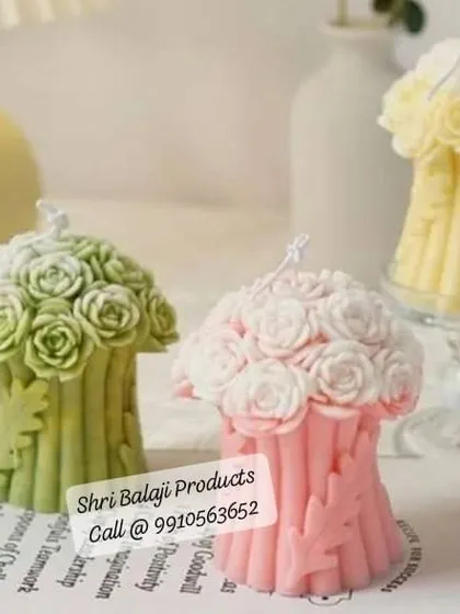 These rose bouquet candles, shown here in soft pastel shades of green, pink, and yellow, are a beautiful decorative item. The mold creates a lovely texture of a bundle of roses.