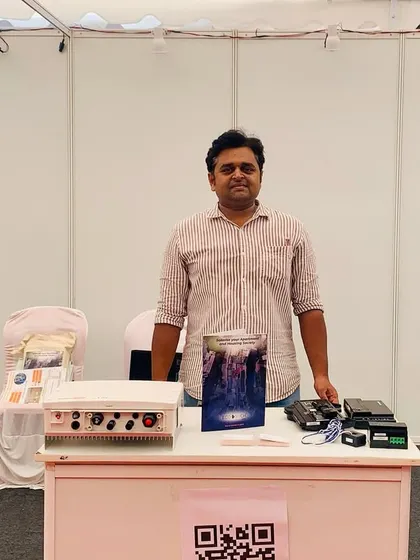 A team member at our booth, ready to provide information on our solar and EV charging solutions for apartment living. Events like these are a great opportunity for us to connect with potential clients face-to-face.