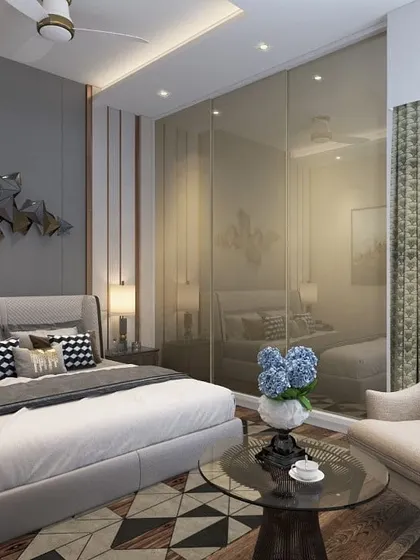 A 3D design for a glamorous bedroom featuring a full-wall mirrored wardrobe that visually doubles the space. The geometric flooring and metallic wall art add layers of modern sophistication.