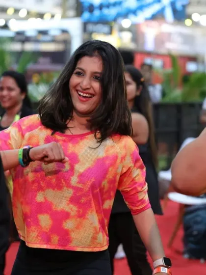 A happy participant dancing her heart out at the IHFF expo.