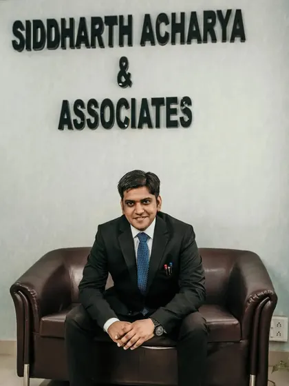 A formal portrait at my office, ready to take on the challenges of criminal litigation.
