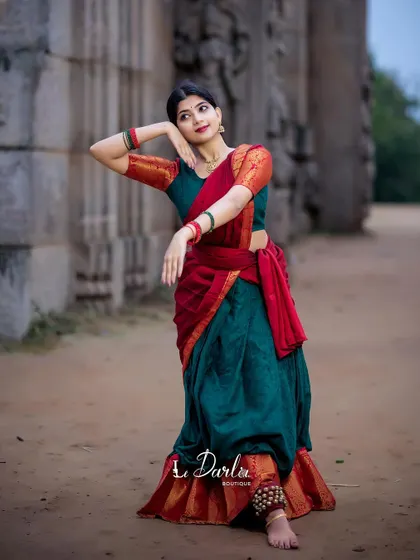 A collection of poses from a cherished photoshoot. The combination of the traditional half-saree and the rustic temple background creates a timeless and elegant look.