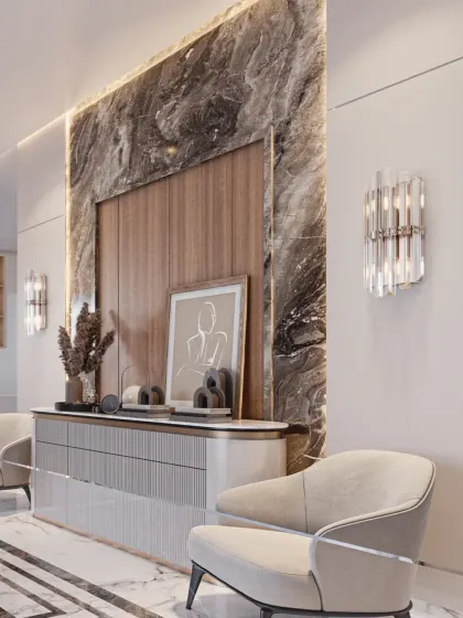 Detail of a console unit in the drawing room. The dramatic marble slab is framed by wood paneling, creating a sophisticated backdrop for curated art and decor.