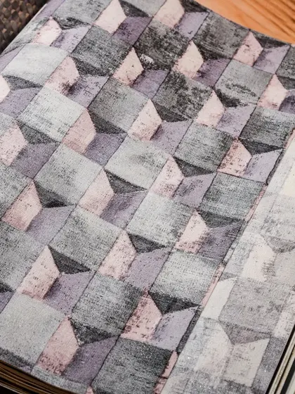 This 3D-effect geometric wallpaper is one of the many unique designs in our collection. Browsing our catalogs reveals textures and patterns that can transform your space into a stunning masterpiece.