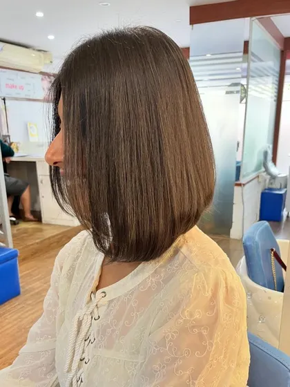 A side view showing the clean angle of the bob.