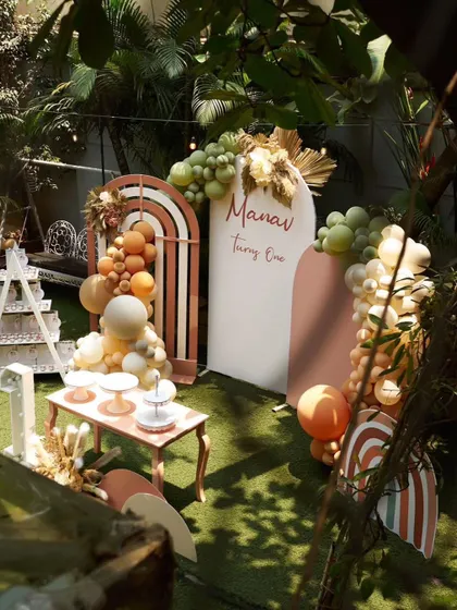 An outdoor view of the boho party decor, showing how the elements come together in a natural garden setting.
