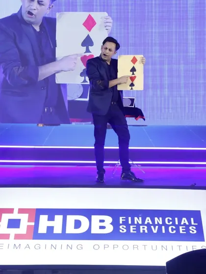 Card magic on a grand scale for HDB Financial Services. This classic trick is always a crowd-pleaser, bringing a moment of simple wonder to a sophisticated corporate audience.