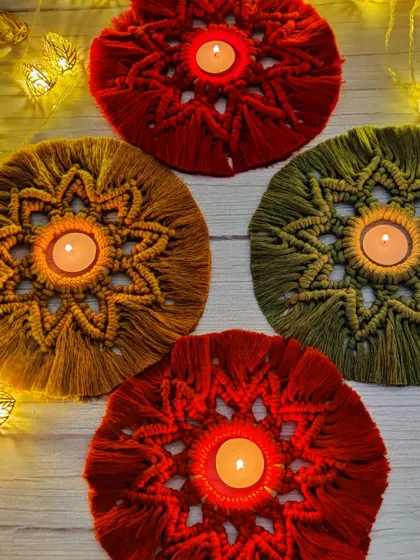 These star-patterned macrame tea light holders are perfect for Diwali. They create a beautiful, warm glow and can also be used as a no-fuss rangoli decoration.
