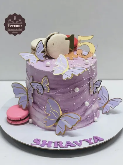 A beautiful lavender cake decorated with purple butterflies and macarons. This chocolate Nutella cake was customized for a client's special celebration.