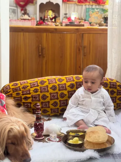 The festive setup for Bengali New Year, with Posto patiently waiting for his meal.