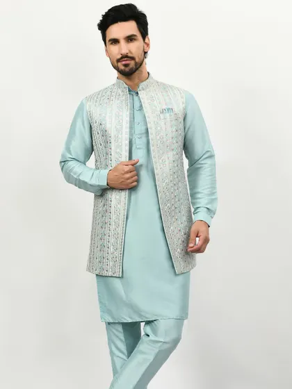 Last minute invite? A Kurta Pajama Jacket is the answer. This pastel blue set with an embroidered jacket offers style, comfort, and a budget-friendly option for any wedding event.