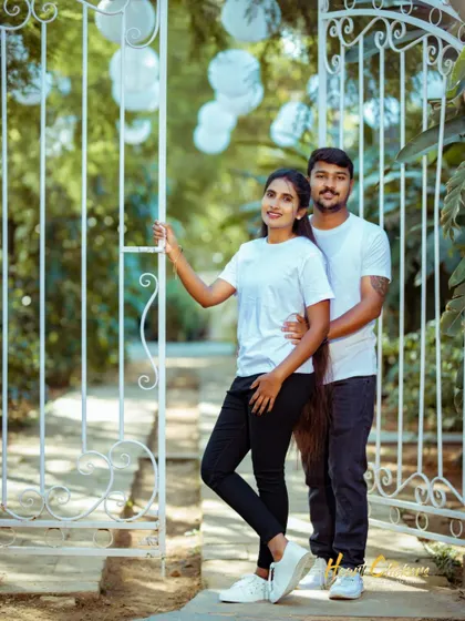 A duplicate of ID 46, this portrait by a white gate is perfect for a relaxed and stylish pre-wedding announcement.