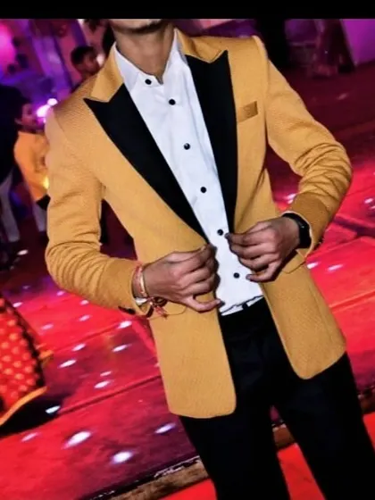 A stylish party blazer in mustard yellow with a contrasting black satin lapel. This is a perfect choice for a cocktail party or reception.
