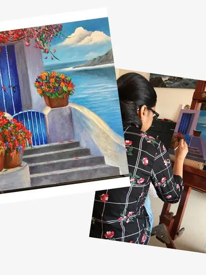 This student is creating a beautiful and vibrant Greek-inspired seascape using acrylics. I love how she is using bright colors for the flowers and the iconic blue door to make her painting pop. It is a wonderful example of capturing a sunny, cheerful scene.