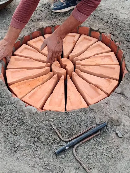 The hands of a skilled artisan are essential in bringing these traditional building techniques to life.