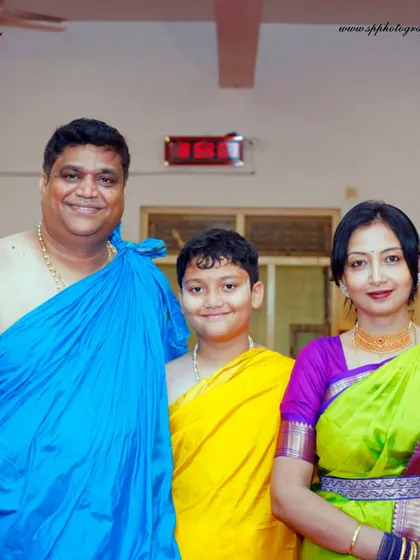 A family portrait taken during an Upanayanam (thread ceremony). We capture the family together in their traditional attire to commemorate this significant rite of passage.