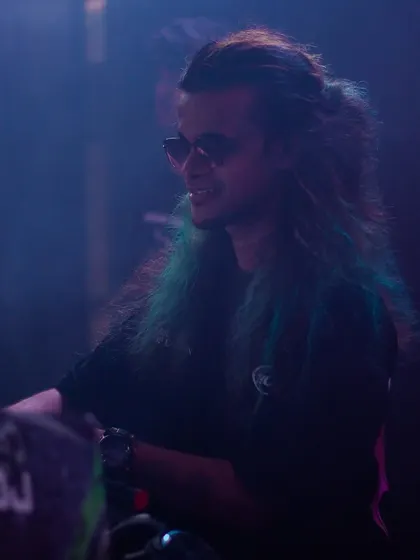 A candid shot of me smiling during a performance.
