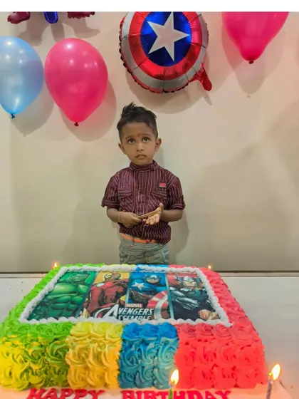 Assemble the heroes for a birthday bash with this Avengers photo cake. The colorful frosting border makes the edible image of the superheroes pop.