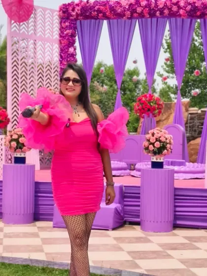 A full view of the stunning purple and pink stage for the Haldi. I love when families choose unconventional color palettes to make their event stand out.