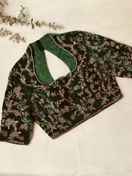 The elegant back of the velvet blouse, perfect for a friend's wedding.
