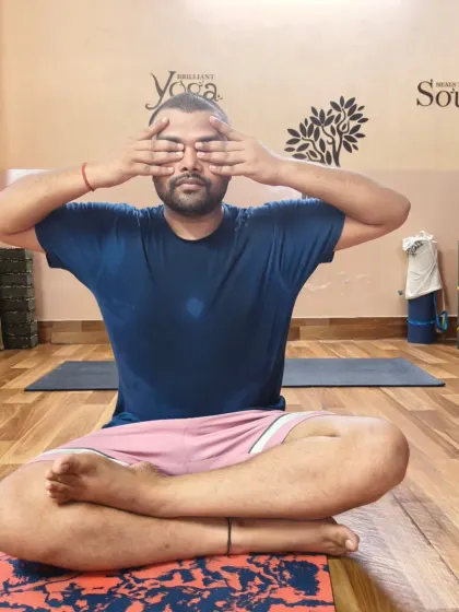 A student demonstrates the hand position for Bhramari Pranayama. We teach the traditional technique to help you gain the maximum benefits of this soothing and healing breathwork practice.