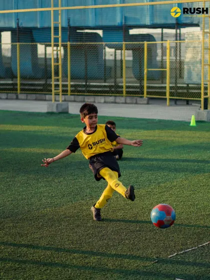 A player strikes the ball with precision, a result of countless hours of dedicated practice.