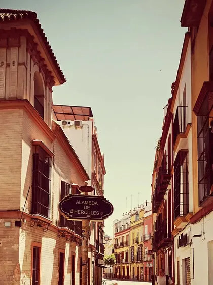 The entrance to Alameda de Hércules, a vibrant plaza in Sevilla known for its bohemian atmosphere and flamenco tablaos. This is the world we immerse ourselves in, where the art form is a part of daily life.