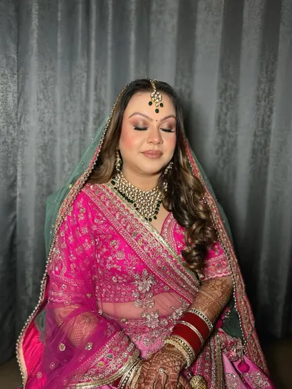Eyes down, showing the beautiful blend of this reception eye makeup.