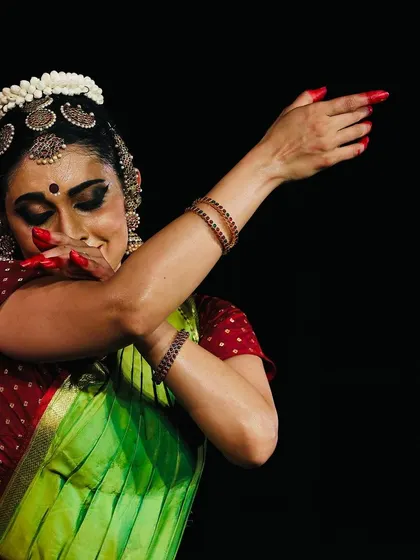 A moment of quiet introspection, captured during a performance at the Krishna Gana Sabha Pongal Dance Festival.