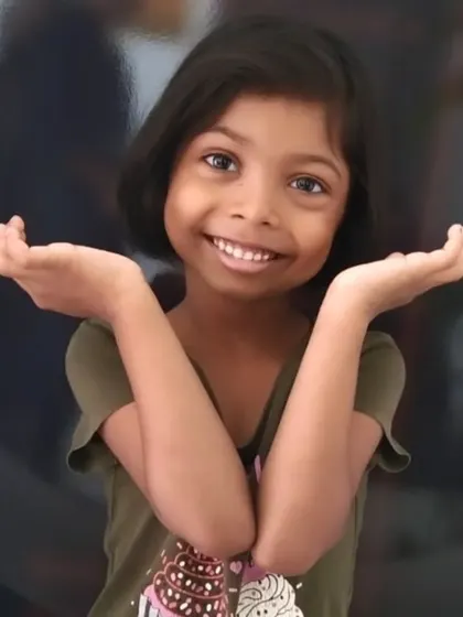 This little diva is ready to shine with her new short bob haircut. Her smile says it all.