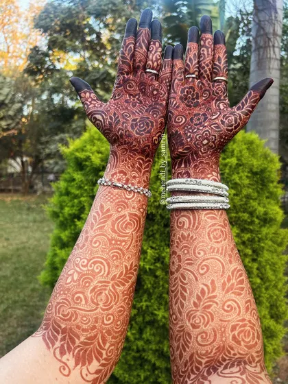 A beautiful outdoor shot showcasing the rich, dark stain. The color looks incredible in the natural light, highlighting every detail of the floral design.
