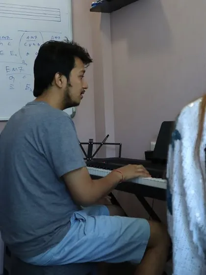 Vocal practice is about finding your voice. Here, a student works with our instructor on keyboard-guided vocal exercises to improve pitch and control.
