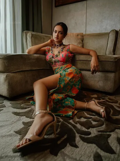 A final shot focusing on the footwear and overall posture, completing the head-to-toe look.
