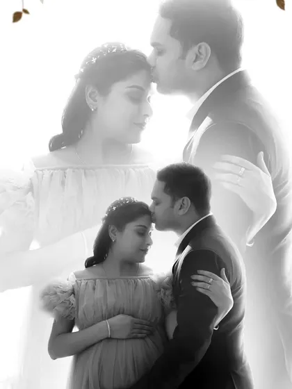 A creative double-exposure edit combines two intimate couple's poses into one artistic, black and white photograph, symbolizing their layered journey.
